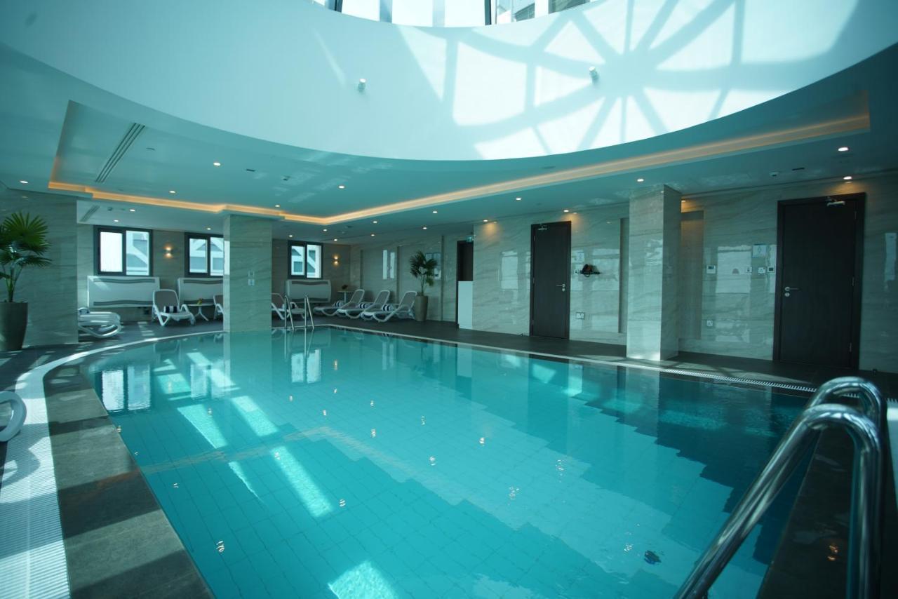 C - Hotel And Suites Доха Экстерьер фото